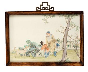 425. A plaque with enameled decor of an old scholar in a garden with a boy and dog, Qing Dynasty, early 20th Century.