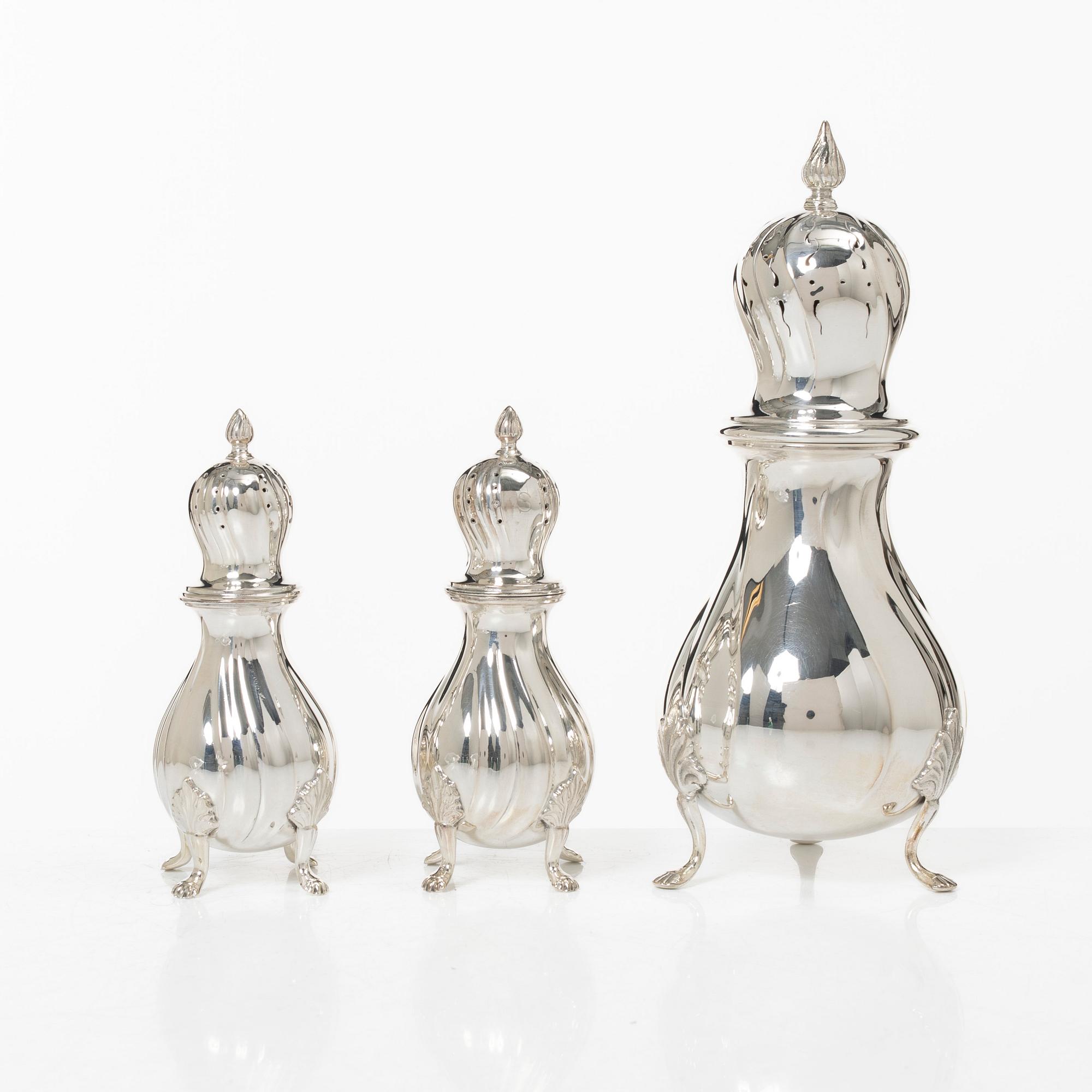 Sugar caster and salt and pepper shakers, silver, marked C.G. Hallberg, including Stockholm 1948.