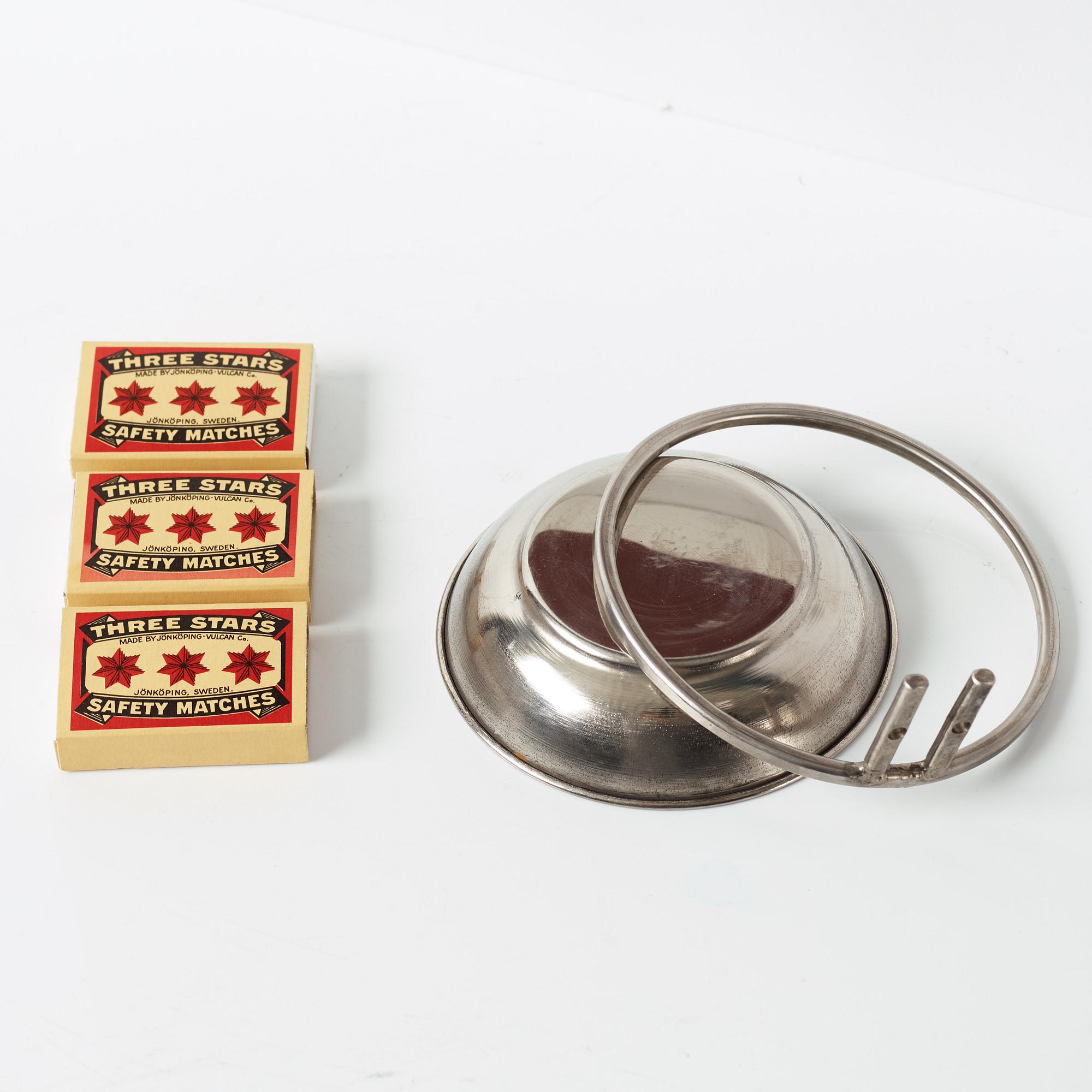 Hans Isaksson, panel, three match cases and a bowl in metal, signed and dated -02.