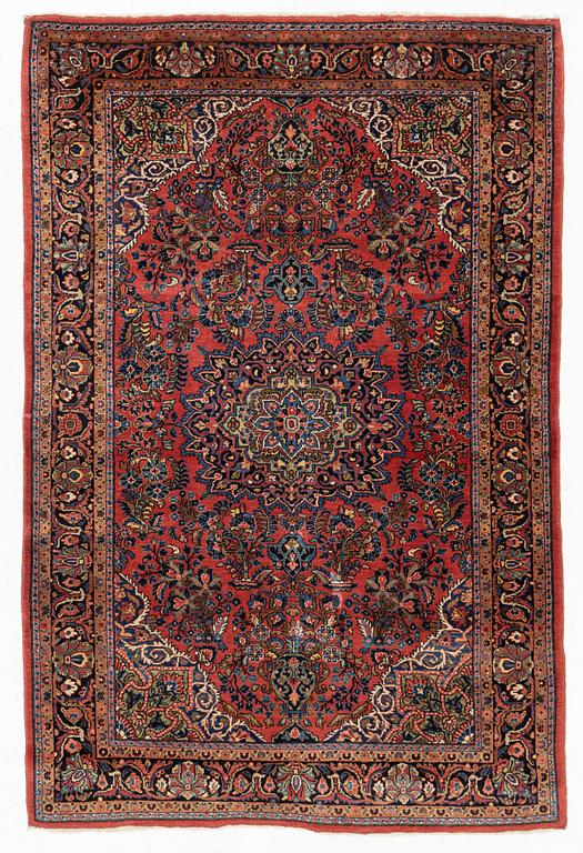 An American Sarouk rug, semi antique, c. 200 x 133 cm.