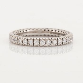 Brilliant cut diamond eternity ring.