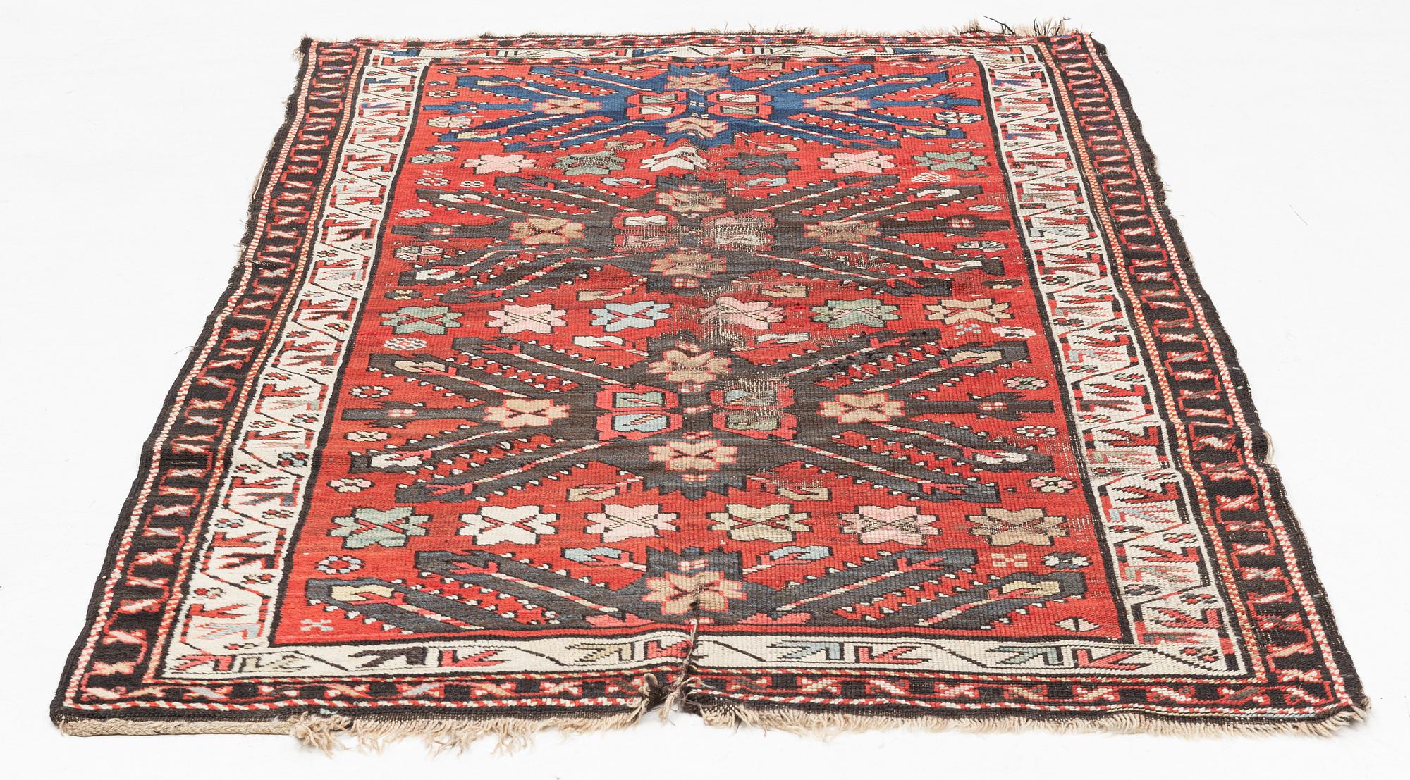 Rug, "Sunburst", Kazak, circa 250 x 137 cm.