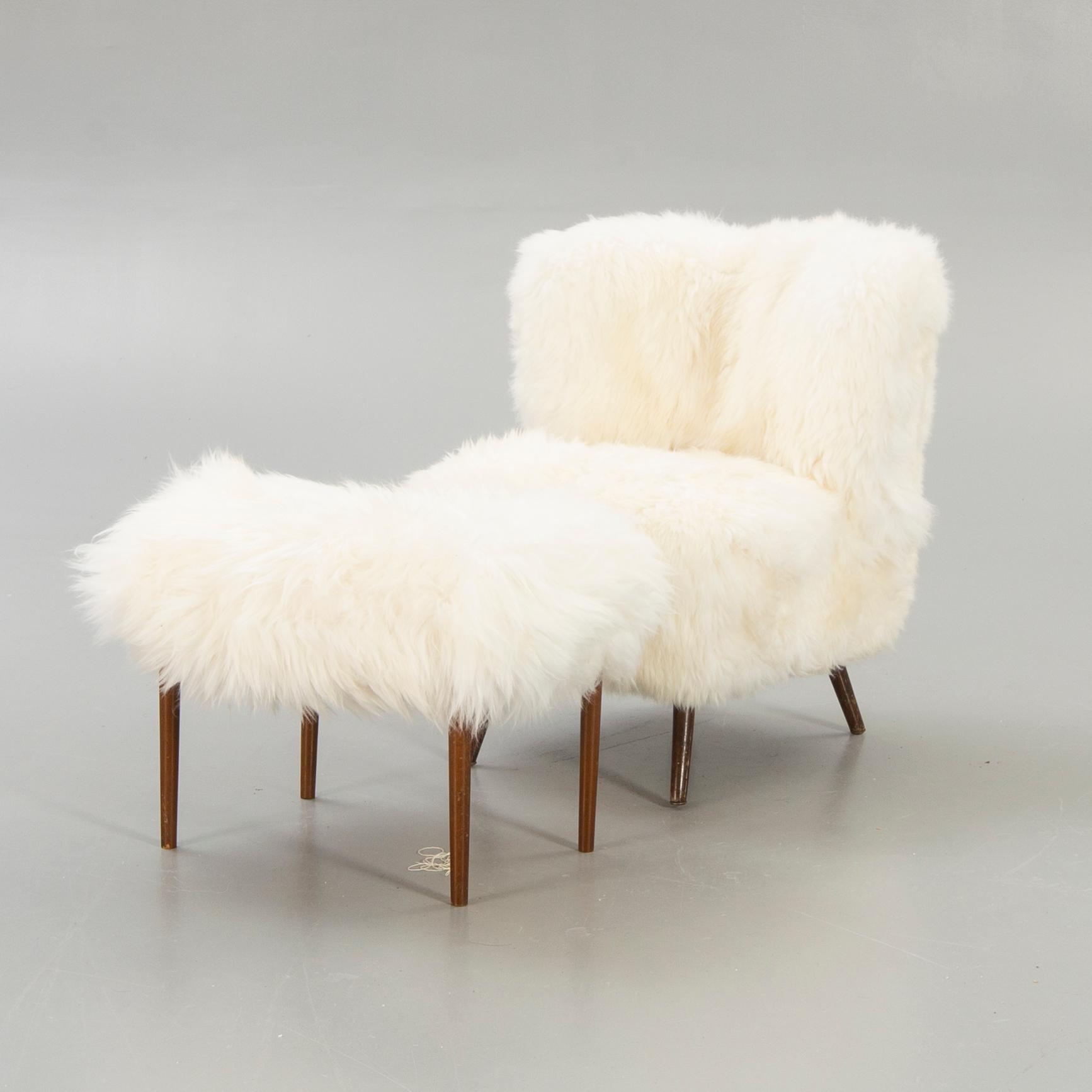 Armchair and footstool, 1950s-1960s.