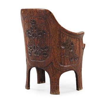 460. A Gustav Fjaestad Art Nouveau carved pine chair, 'Stabbestol', by Adolf Swanson, Arvika, Sweden 1908.