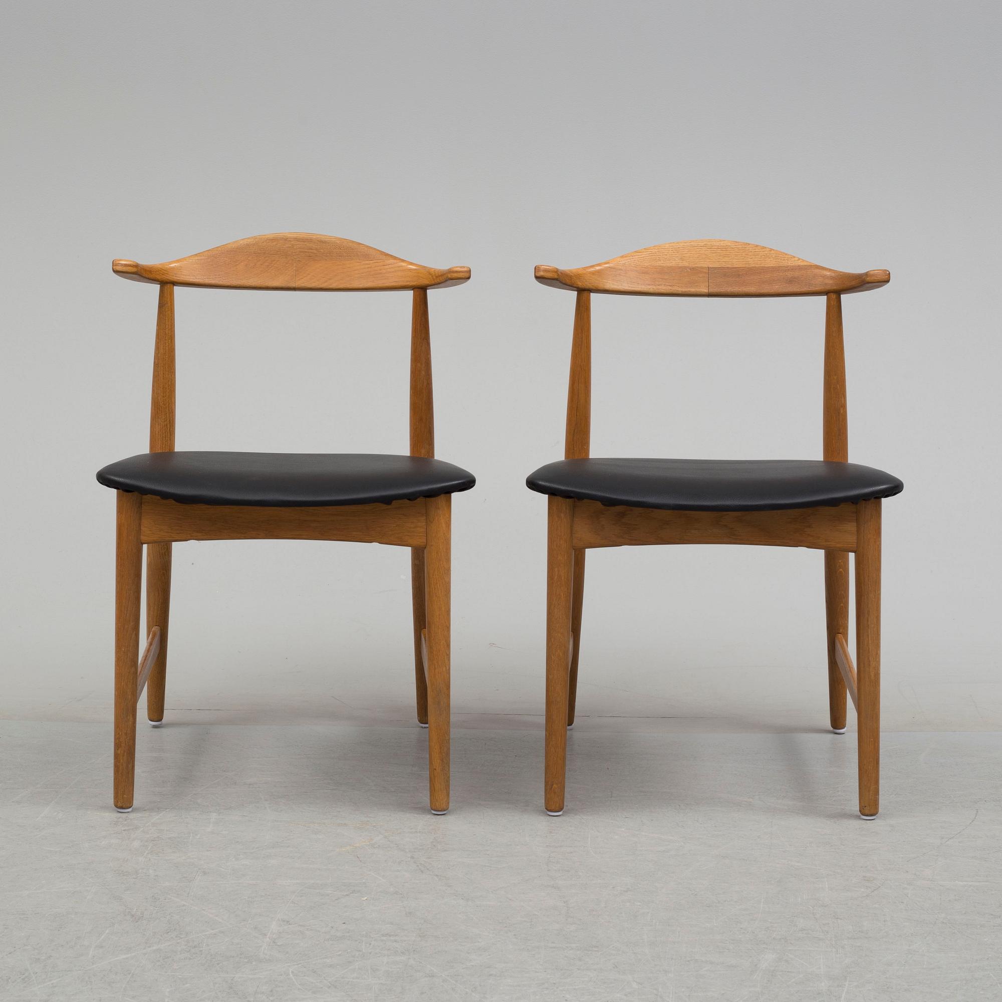 A pair of 1960's 'Danske' oak armchairs by Erik Wörtz IKEA.