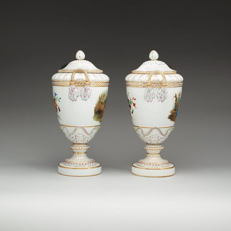 A pair of Berlin KPM jars with covers, circa 1900.
