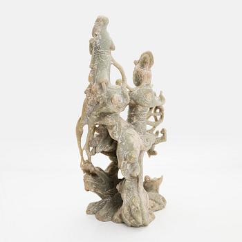 A large soapstone sculpture group of Guanyin, 20th century.