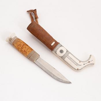 A reindeer horn knife by Johan Tuuri, signed and dated 1981.