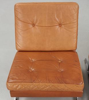 A pair of Poul Nørreklit chromed steel and brown leather easy chairs, Selectform, Denmark 1960's.