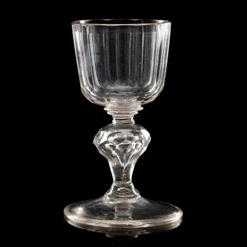 606. A German cut glass wine goblet, 18th Century.