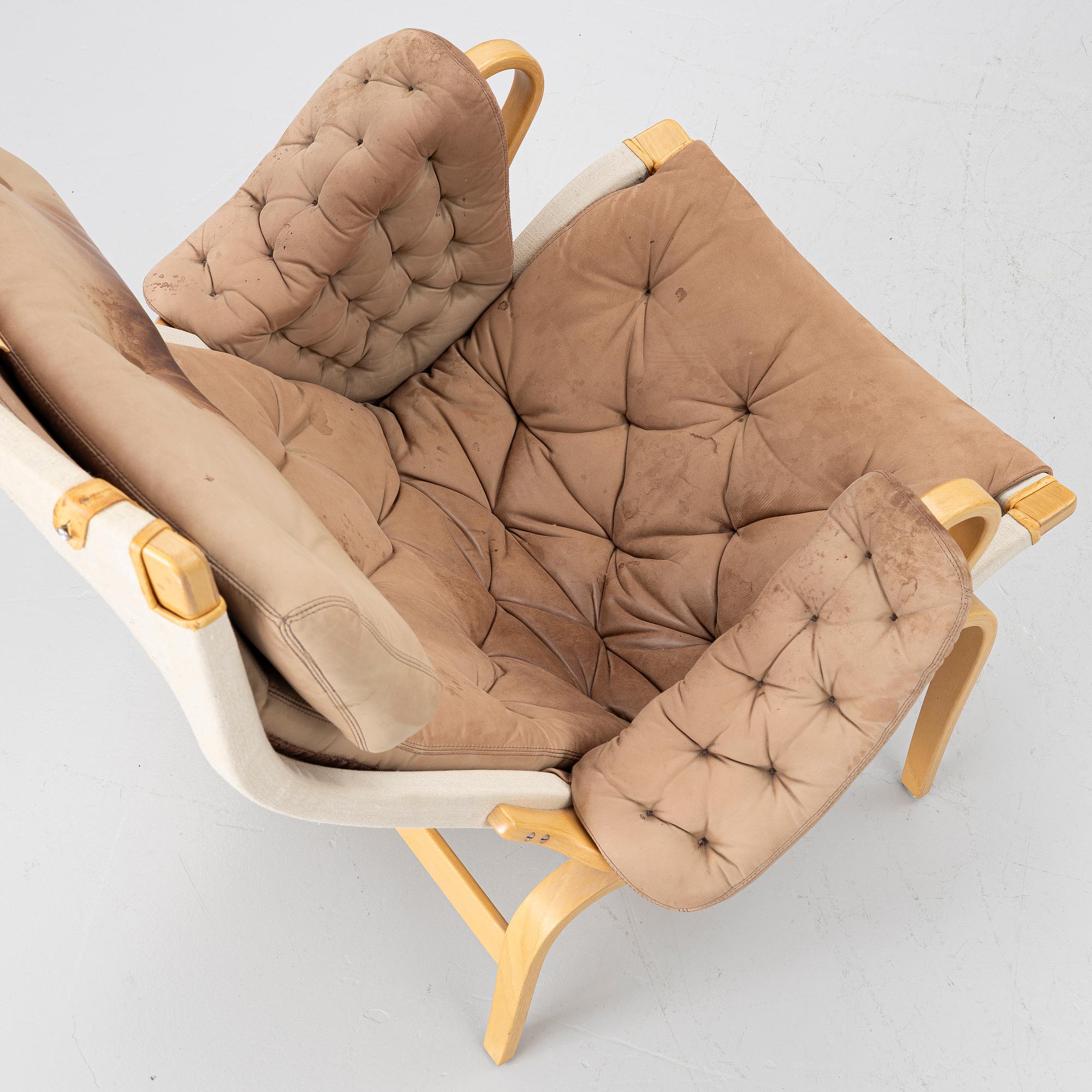 Bruno Mathsson, a 'Pernilla' armchair and ottoman, Dux.