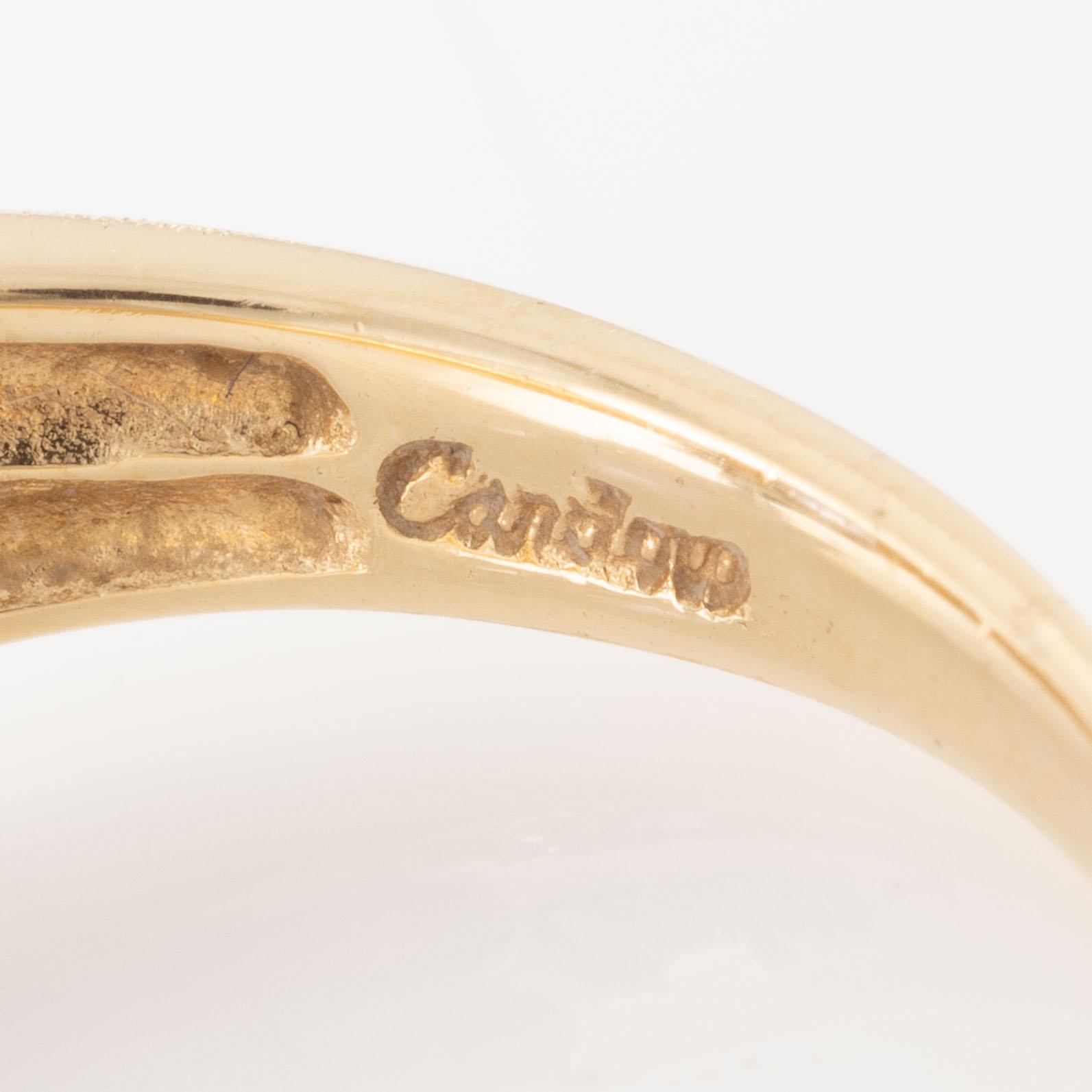 Ring, 14K gold with tanzanite and brilliant-cut diamonds.