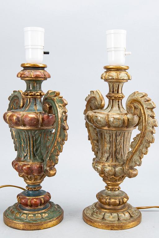 Four mid 20th century wood table lamps from Paoletti, Firenze Italy.