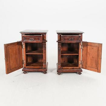 A pair of walnut bedside tables first half of the 20th century.