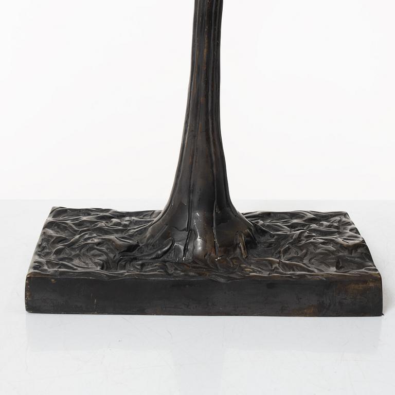 A bronze table lamp, circa 2000.