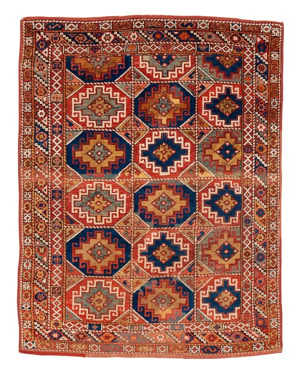 A rug, antique Bergama, ca 199-202 x 154-158 cm (and 2,5-3 cm "flat weave" at the ends),