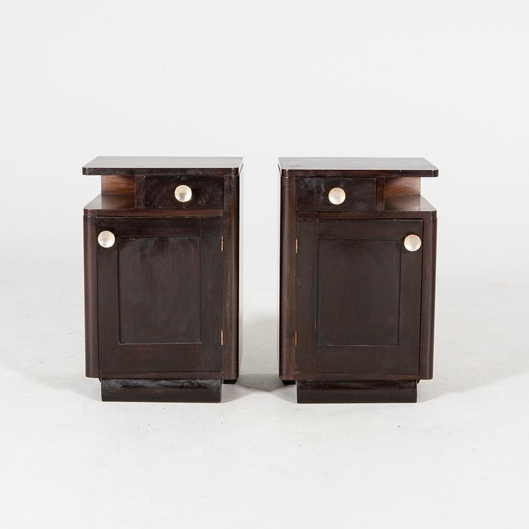 A piar of stained Art Deco bedside tables first half of the 20th century.