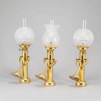 A set of three brass kerosene lamps GV Harnisch Denmark later part of the 20th century.