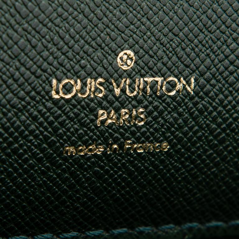 Louis Vuitton, A Taiga leather 'Minuto' Briefcase.