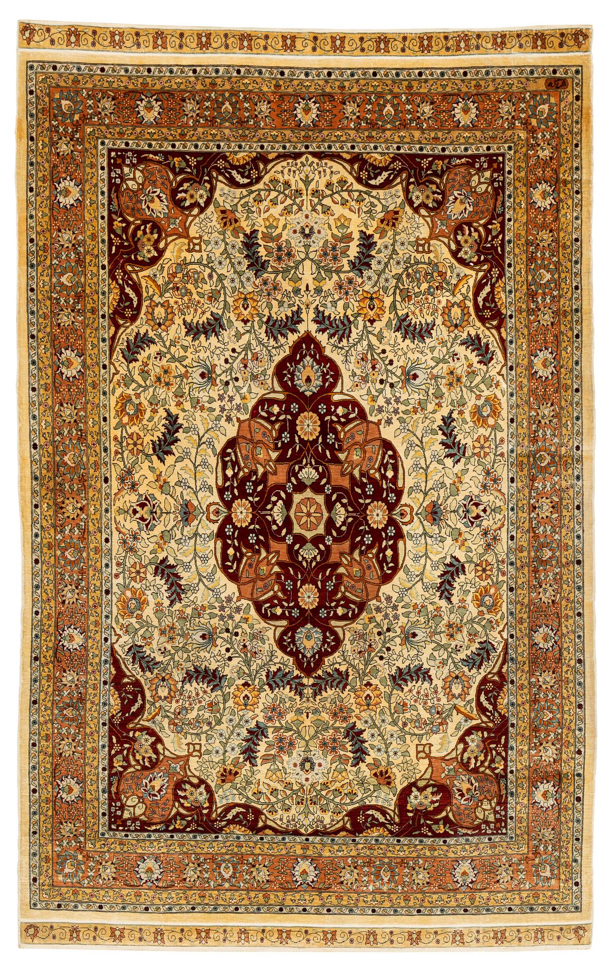 A rug, semi-antique, silke Hereke, signed, ca 184,5 x 118 cm.