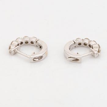 Brilliant cut diamond earrings.