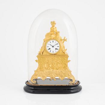 A Louis XV-style table clock, late 19th century.