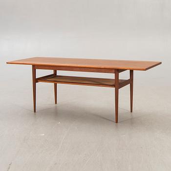 A Dansih 1960s teak and rattan  coffee table.