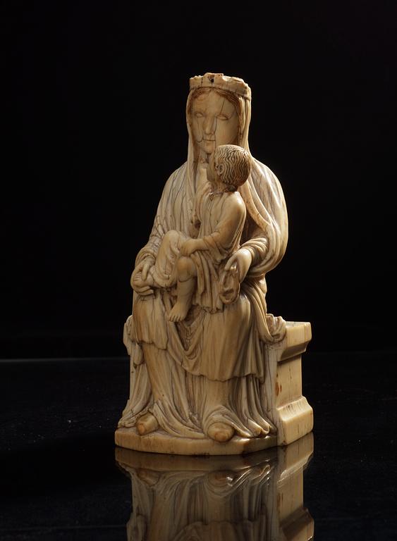 Virgin and Child, a French Gothic ivory statuette, second half of the 13th century.