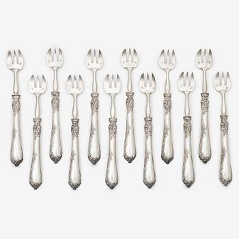 alphonse Debain, twelve silver oyster forks, Paris, France, 1883-1911.