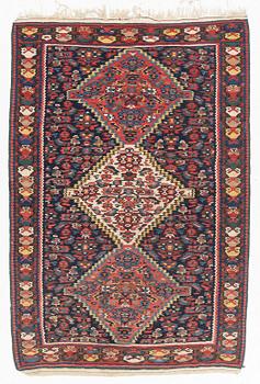 An oriental rug, circa 167 x 114 cm.