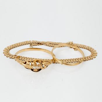 PARTI GULDSMYCKEN, 3 delar, 18K guld. Vikt 57g.