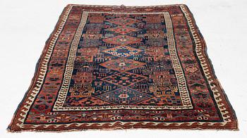 An antique Kurdish / Turkish carpet by the Herki Tribe, c 233 x 137 cm.