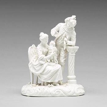 263. A white glazed porcelain figure of a courting couple with a cat, Frankenthal, 18th Century.