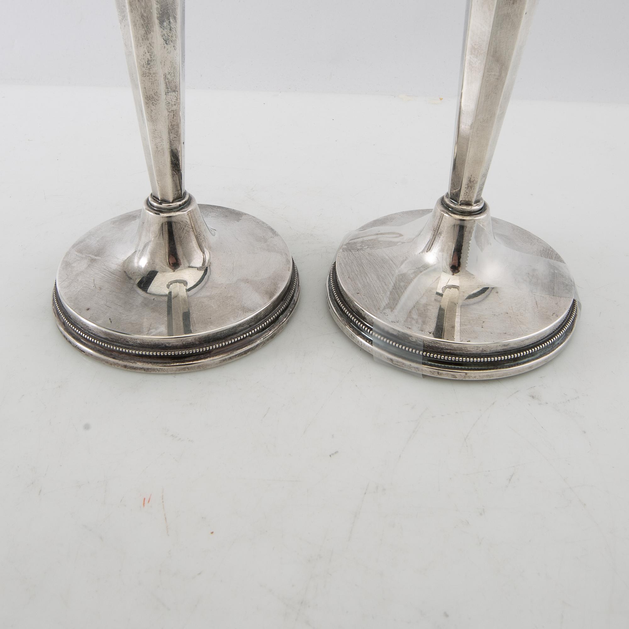 Eric Löfman, candlesticks, a pair, silver, MGAB, Uppsala, 1974.