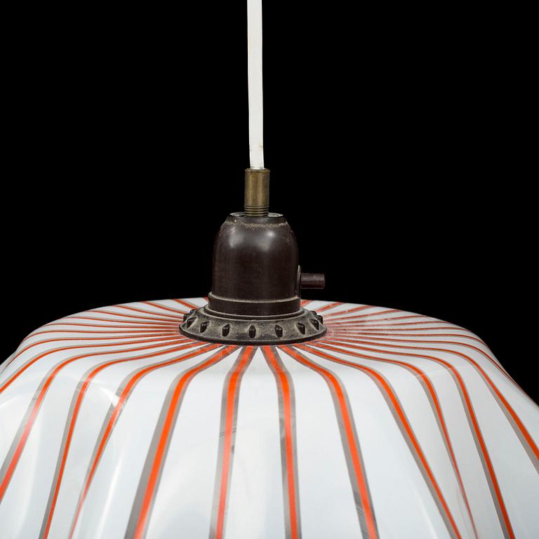 A 1950s glass ceiling light.