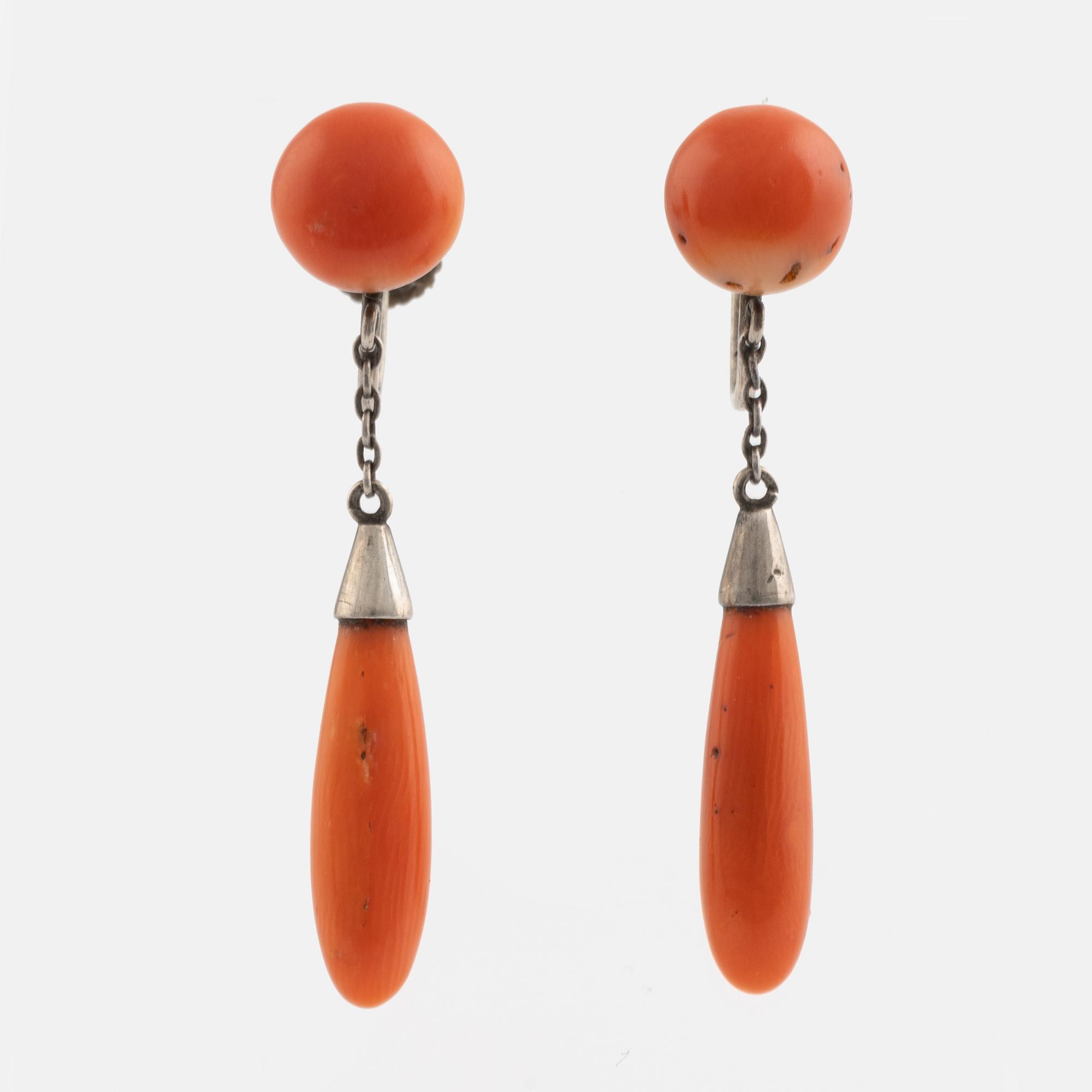 Silver and coral earrings and brooch.