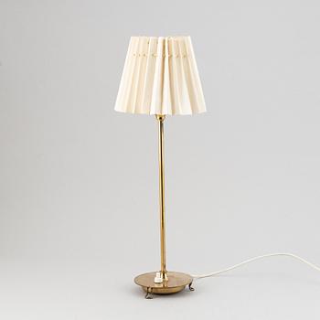 A model 2552 brass table lamp by Josef Frank for Firma Svenskt Tenn.