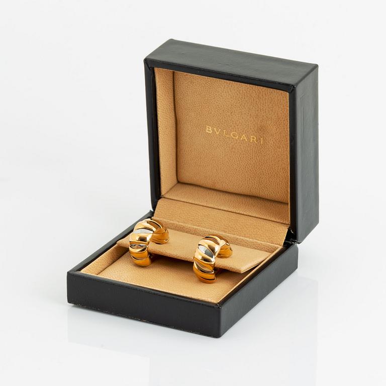 A pair of 18K gold and steel Bulgari earrings.