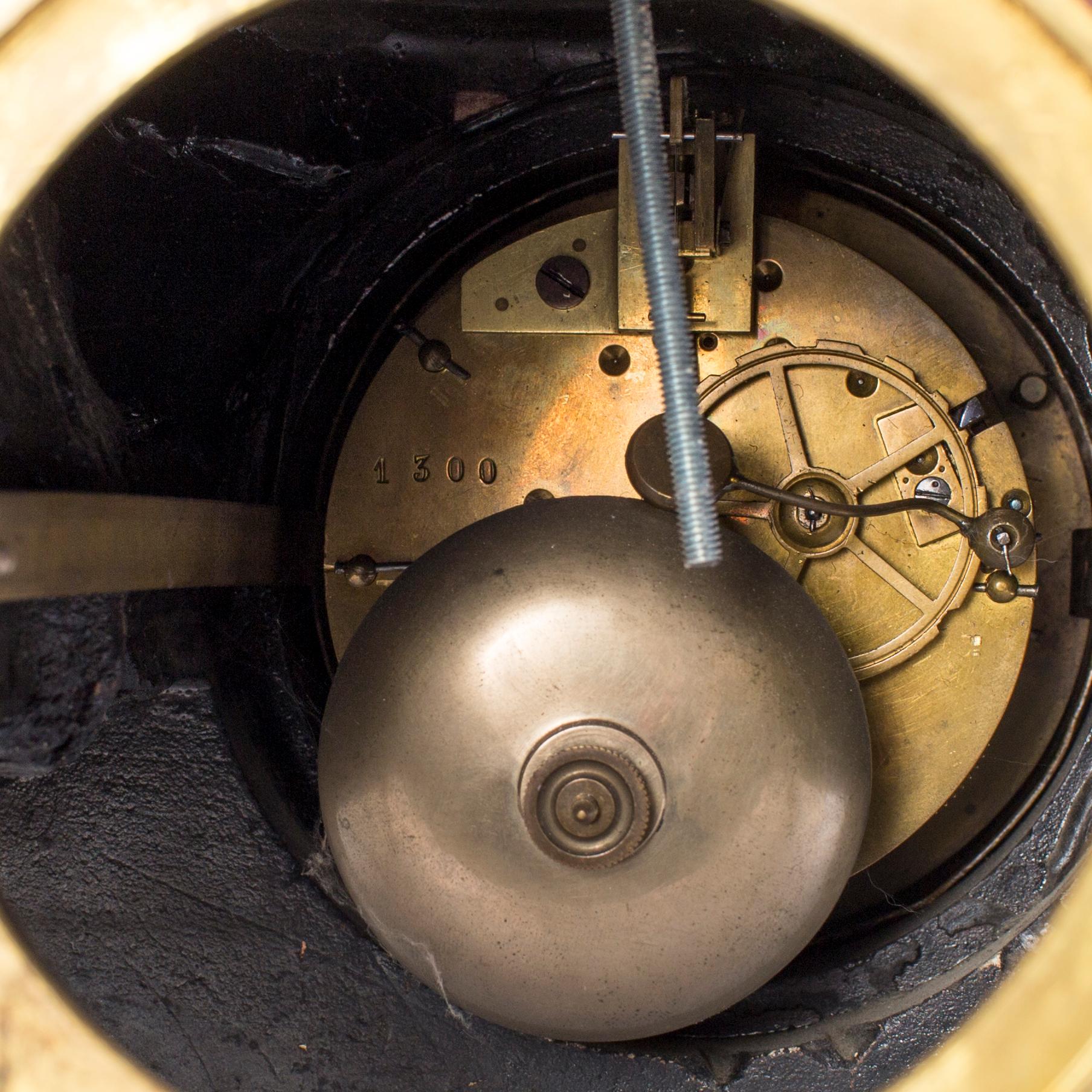 A mantel clock with sculpture "L'occident" after Émile Bruchon from the turn of the century 1800/1900.