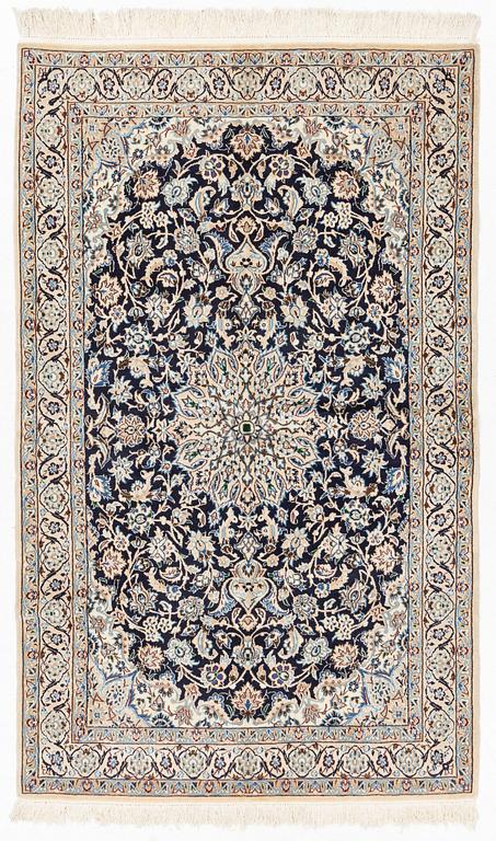 An oriental rug, ca 204 x 126 cm.