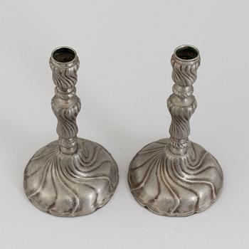 A PAIR OF ROCOCO PEWTER CANDLESTICKS, 18th century.