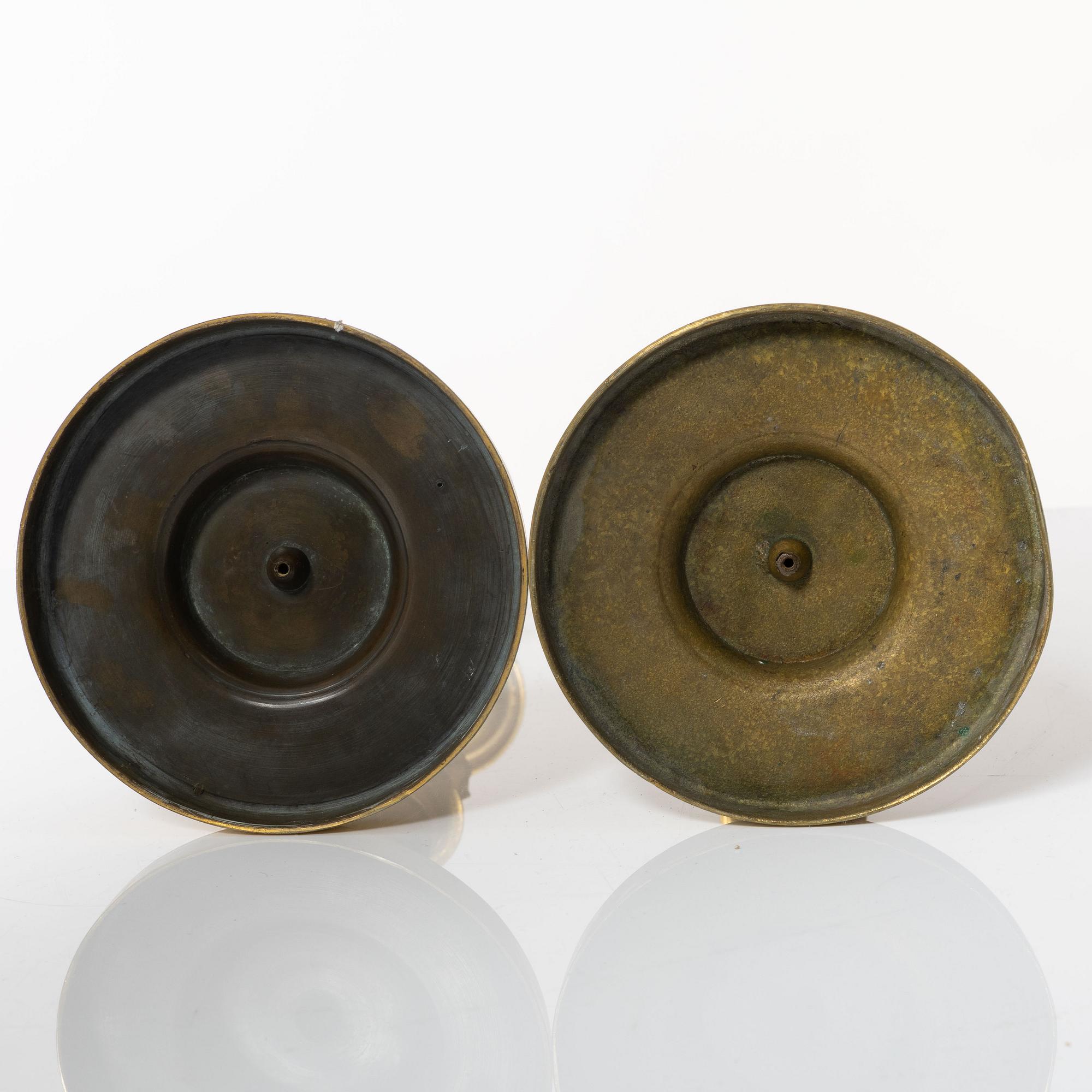 A matched pair of candlesticks, Empire, France, first half of the 20th century.