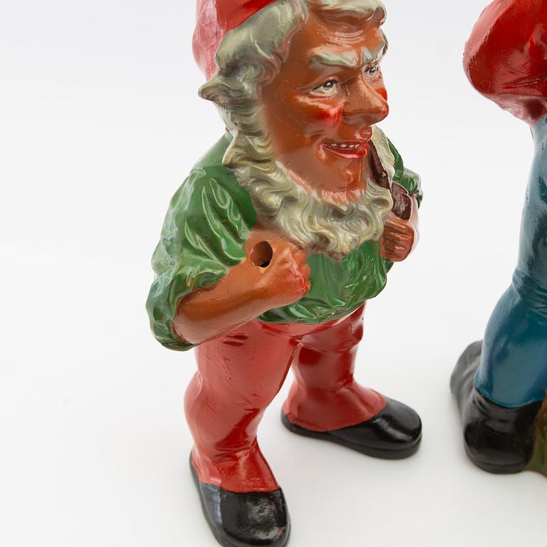 A collection of gnomes 12 pcs mid/late 20th century mostly painted terracotta.