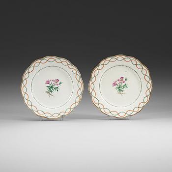 389. A pair of famille rose armorial dishes for Claes Alströmer, Qing dynasty, Qianlong (1736-95), ca 1770.