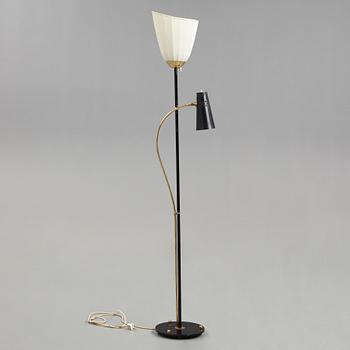 A Swedish Modern brass and black lacquered floor lamp, 1950's.