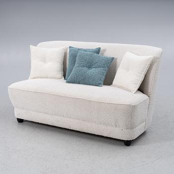 A contemporary sofa and armchair, Boom Interior.