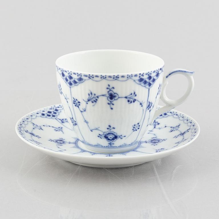 A large 'Blue Fluted Half Lace' porcelain tea cup with saucer, Royal Copenhagen, model 703, post 1923.