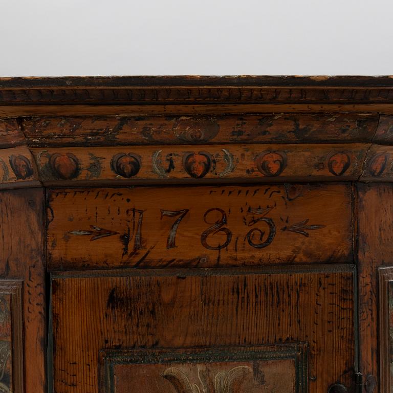 Corner hanging cupboard Southern Sweden dated 1783.