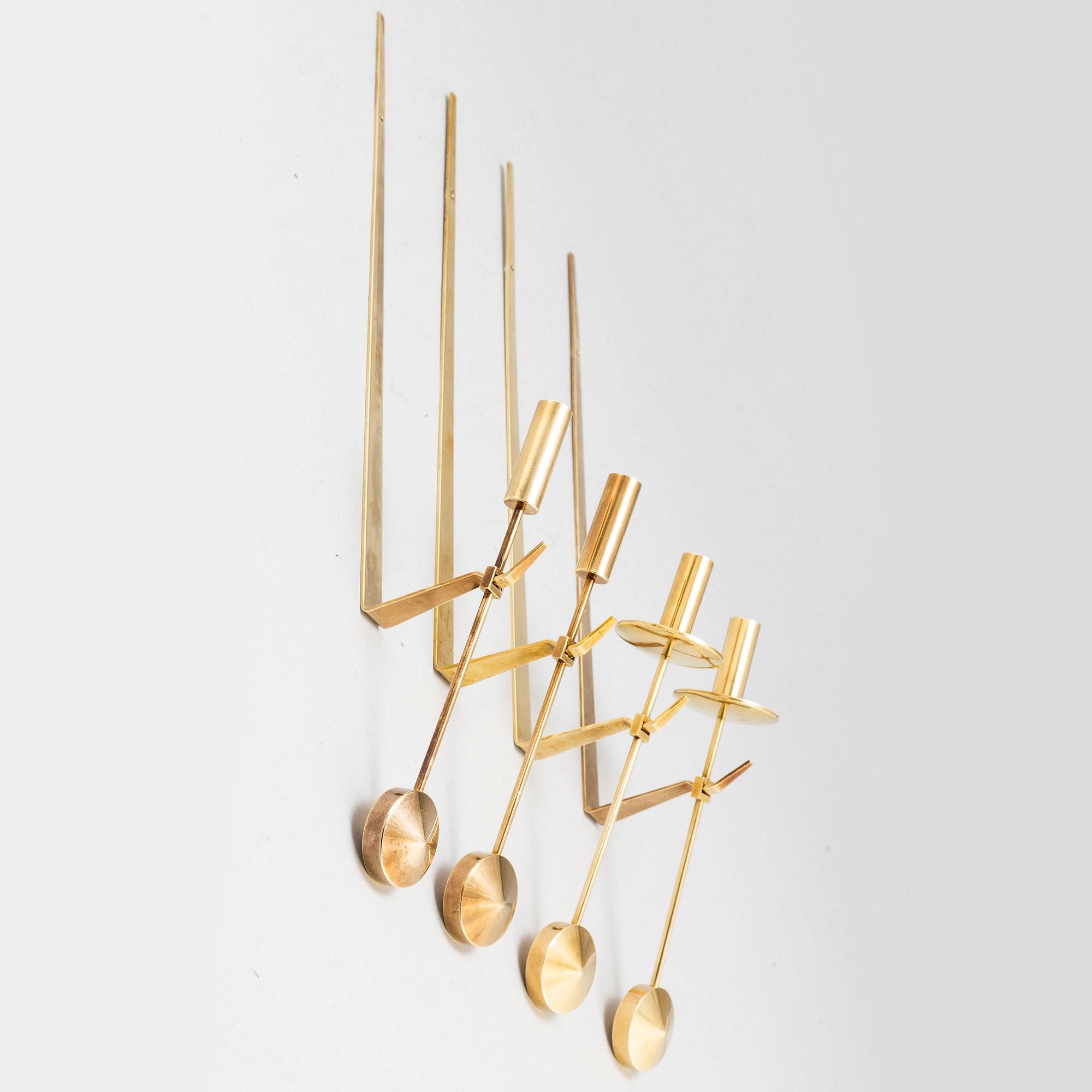 A set of four wall sconces by Pierre Forsell, Skultuna.