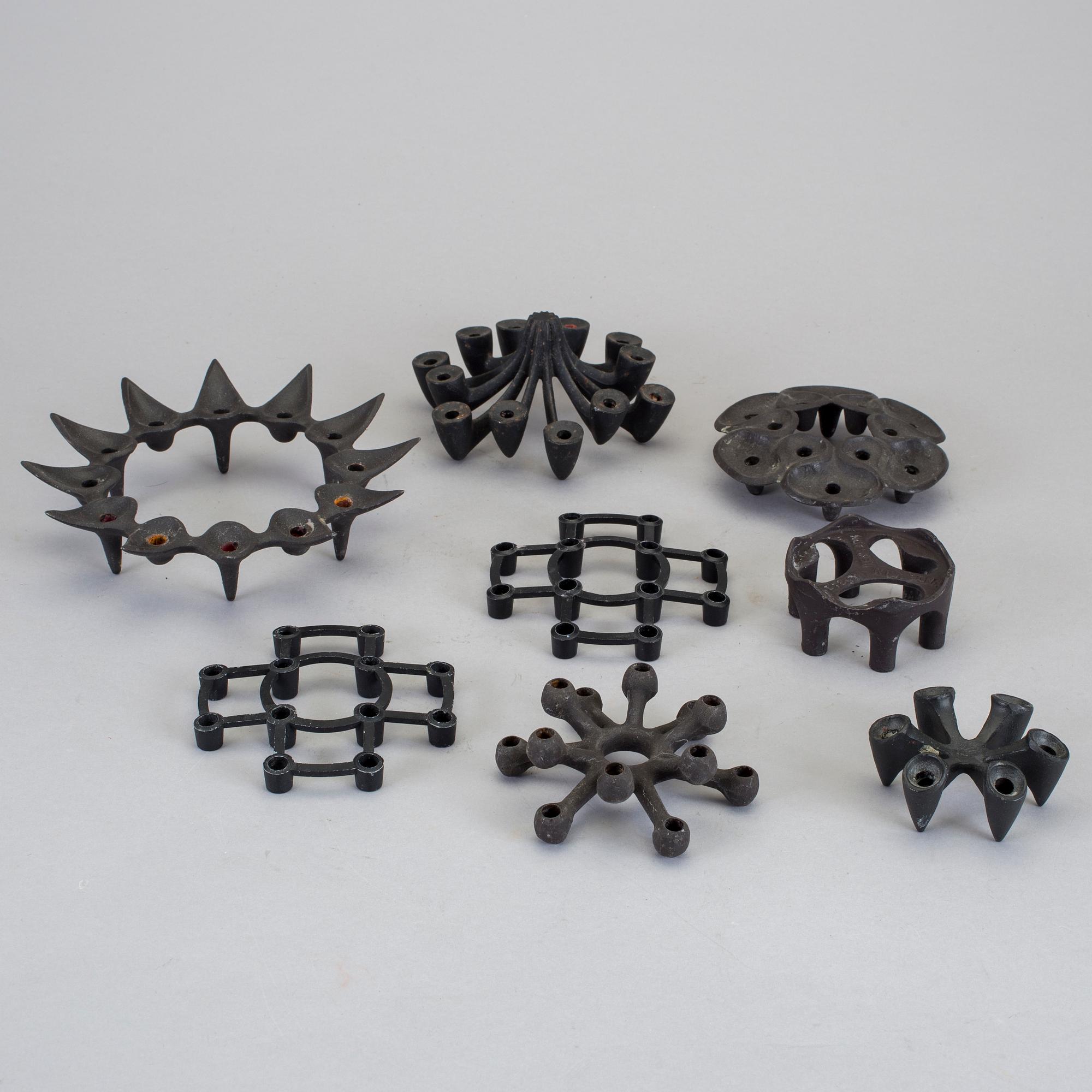 LJUSSTAKAR, 8 st, gjutjärn, design, Danmark, varav 3 st Jens Harald Qvistgaard, slutet av 1900-talet.